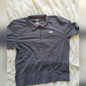 The northface mens size XL zip up polo small snag on back see photo North Face